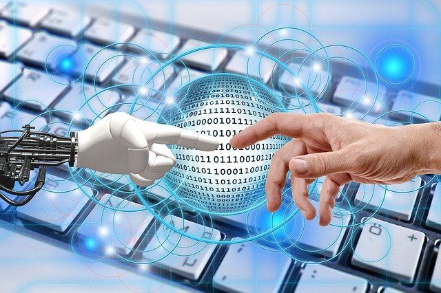 hand-robot-human-keyboard