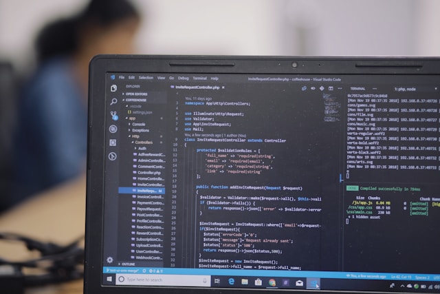 coding on laptop